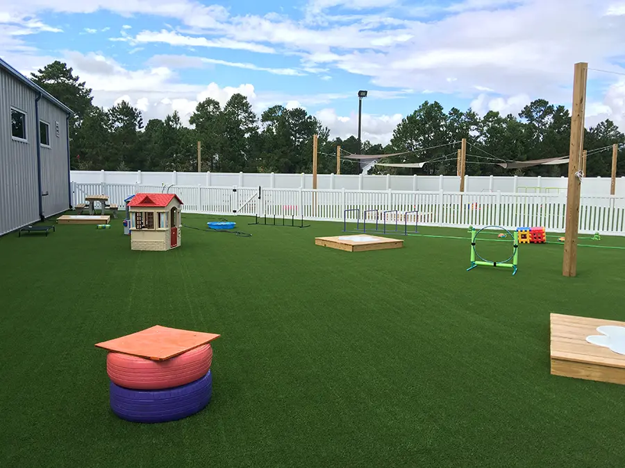 Event-ready artificial lawn with lounge furniture